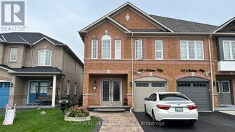 60 Nahani Way in Mississauga, ON - Building Photo
