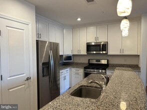 20141 Riesling Ln-Unit -106 in Lewes, DE - Building Photo - Building Photo