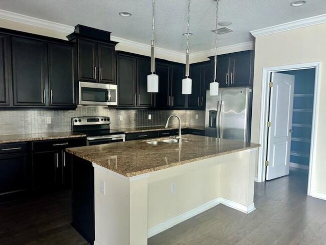 8883 Randal Park Blvd in Orlando, FL - Foto de edificio - Building Photo