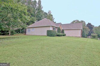 21 Wellington Mnr Dr, Unit 202 in Sharpsburg, GA - Foto de edificio - Building Photo