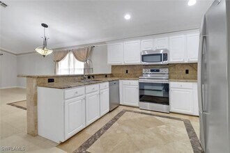 15028 Savannah Dr in Naples, FL - Building Photo - Building Photo