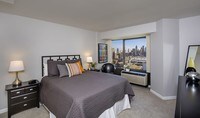 Spacious Bedrooms With a View - Riverfront Towers Apartments in Detroit, Michigan