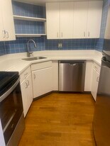 140 Pleasant St, Unit 401## in Brookline, MA - Building Photo