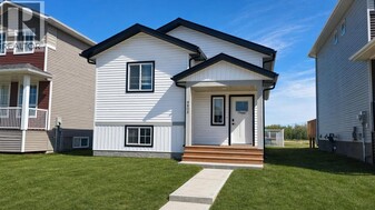 9805-9889 89 St in Grande Prairie, AB - Building Photo