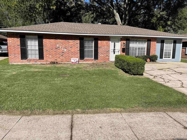 property at 5115 Woodlawn Ave