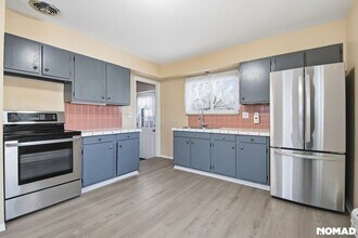 1182 W Ida Ave in Littleton, CO - Foto de edificio - Building Photo