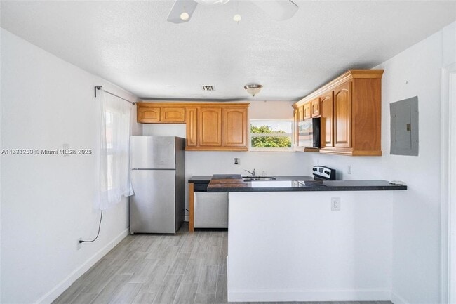 property at 6221 NW Miami Ct