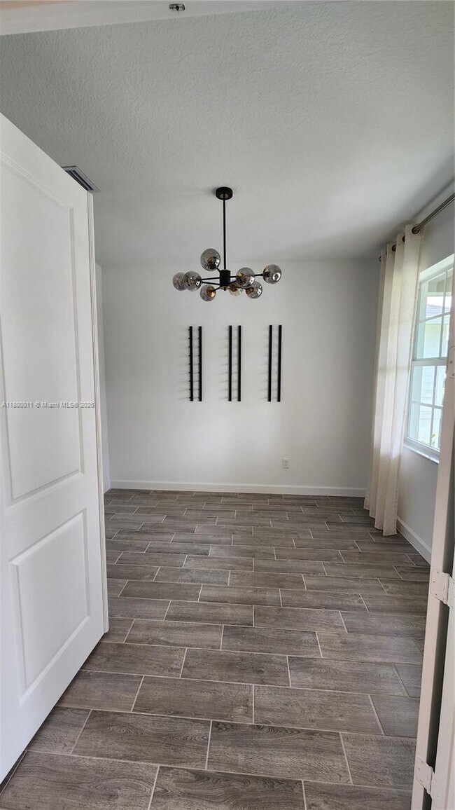 1767 Wandering Willow Wy in Loxahatchee, FL - Building Photo - Building Photo