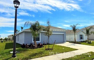 12101 Amber Waves Rd in Lehigh Acres, FL - Building Photo