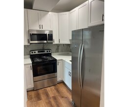 1211 Poplar Grove St in Baltimore, MD - Foto de edificio - Building Photo