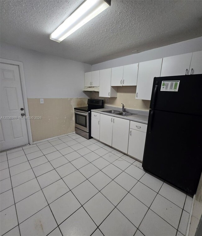 property at 5880 NW 19th Ct