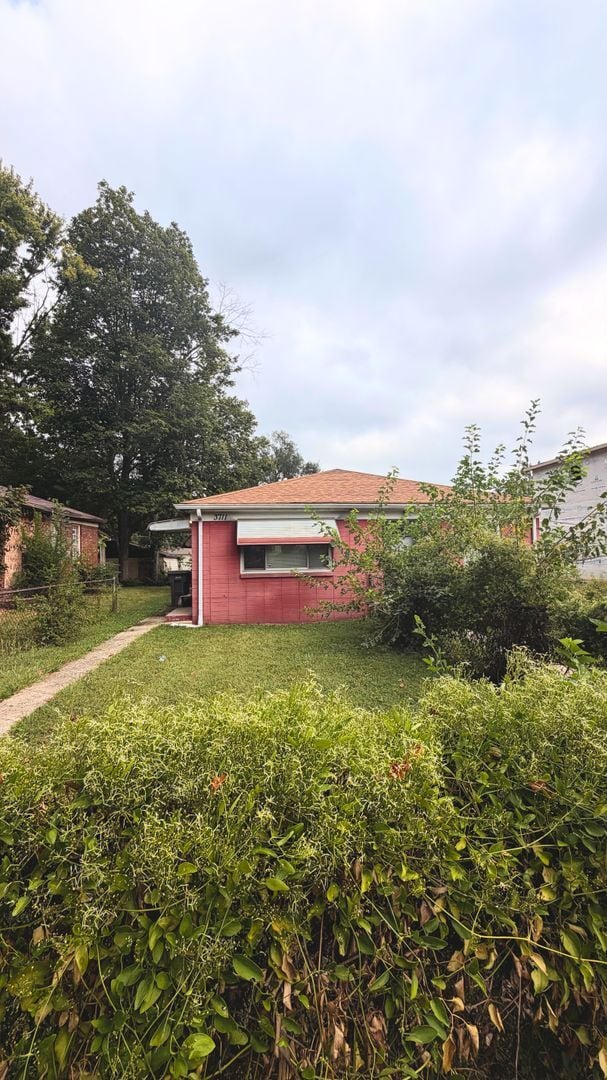 property at 3709-3711 Kinnear Ave