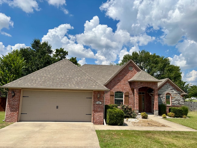 property at 702 SW Barn Valley Rd