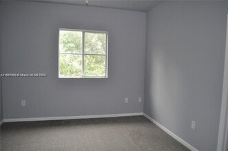 8306 Santa Monica Ave in Tamarac, FL - Building Photo - Building Photo