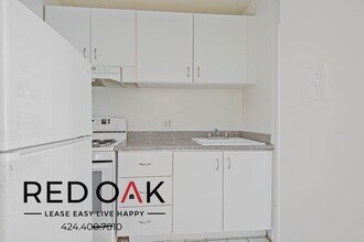 723 S Mansfield Ave in Los Angeles, CA - Building Photo - Building Photo