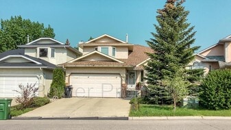 198 Arbour Summit Close NW in Calgary, AB - Building Photo