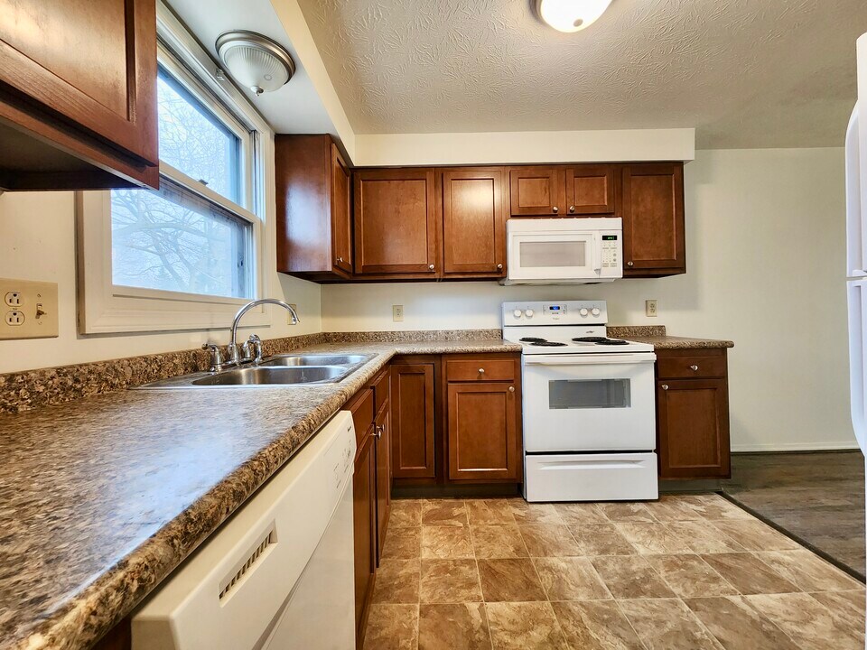 34 Orchard St, Unit A in Webster, NY - Building Photo
