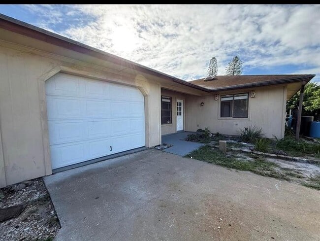 property at 8736 SE Algozzini Pl