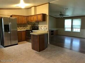 446 Chemin Metairie Rd in Youngsville, LA - Building Photo - Building Photo