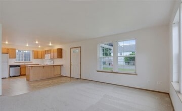 Bright Everett Home with 2-Car Garage in Everett, WA - Building Photo - Building Photo