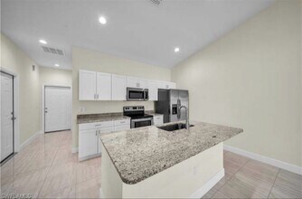 2118 Zaharihas Dr in Lehigh Acres, FL - Building Photo - Building Photo