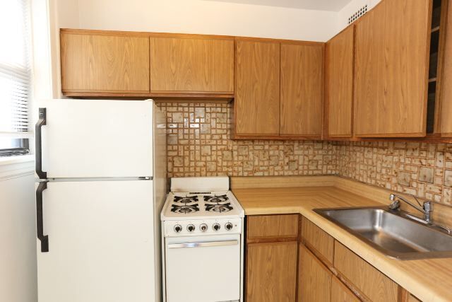 735 W Belmont Ave, Unit E00P in Chicago, IL - Building Photo - Building Photo