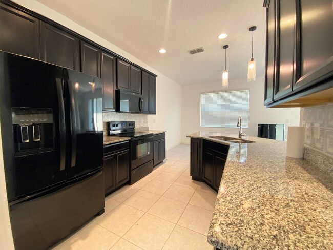 769 Star Magnolia Dr in Kissimmee, FL - Foto de edificio - Building Photo