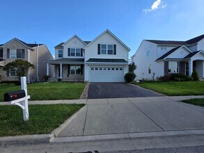 329 Dovetail Dr in Lewis Center, OH - Building Photo - Building Photo