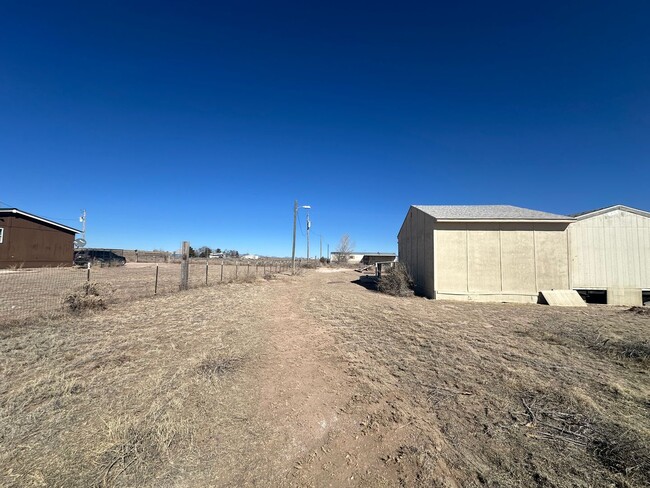 64 Viajero Ave in Moriarty, NM - Building Photo - Building Photo