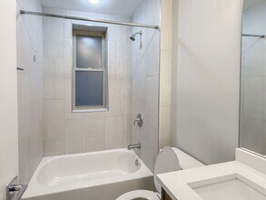 3919 N Janssen Ave, Unit 1E in Chicago, IL - Building Photo - Building Photo