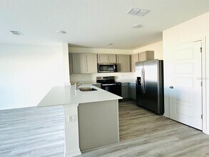 1335 Tallowwood Ln in Davenport, FL - Building Photo - Building Photo