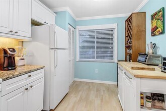 3041 Sandpiper Bay Cir, Unit 201 in Naples, FL - Building Photo - Building Photo