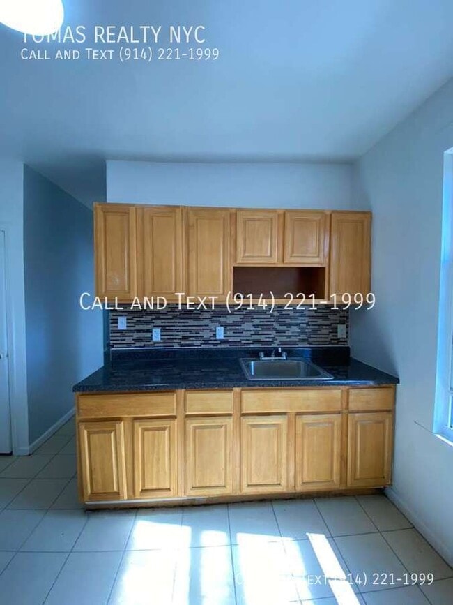 property at 67 Van Cortlandt Park Ave