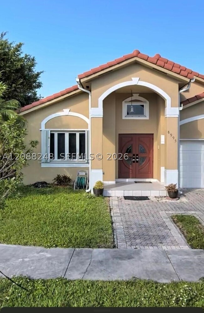 property at 8995 NW 148th St