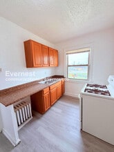 13909 Hartwell St, Unit 7 in Detroit, MI - Foto de edificio - Building Photo