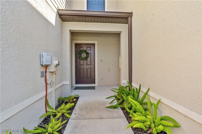 14026 Oviedo Pl in Tice, FL - Building Photo - Building Photo