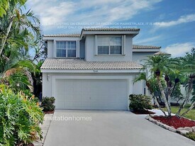 7549 Lake Placid Ct in Lake Worth Beach, FL - Building Photo