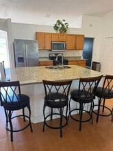 1013 SW London Ln in Port St. Lucie, FL - Building Photo - Building Photo