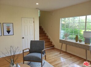 1037 S Longwood Ave in Los Angeles, CA - Building Photo - Building Photo