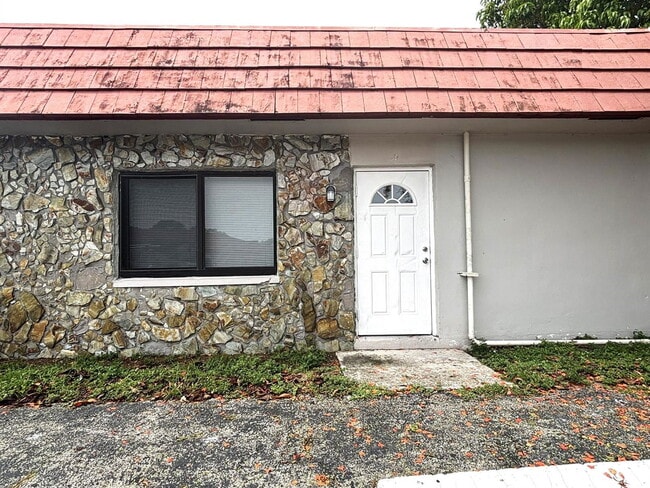 property at 7635 SW 10th St