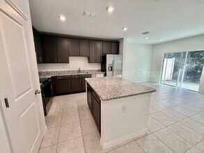 1622 Fan Palm Dr in Davenport, FL - Building Photo - Building Photo