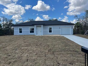 239 E Canal Way NE in Lake Placid, FL - Building Photo - Building Photo