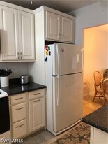 150 Turtle Lake Ct in Naples, FL - Building Photo