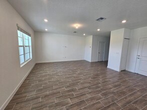 19672 WHISPERING CREEK Rd in The Acreage, FL - Building Photo - Building Photo