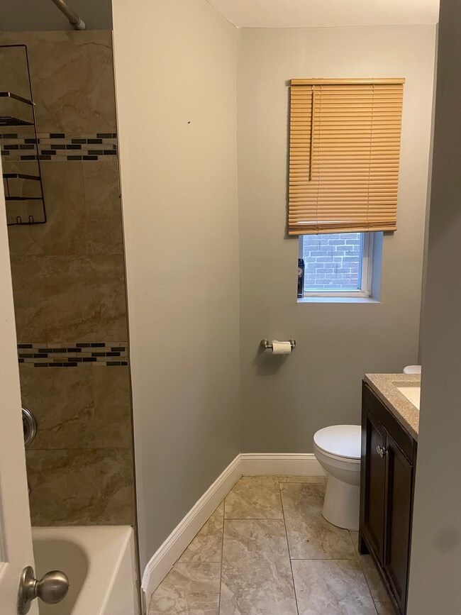 102 Denison St, Unit 1 in Baltimore, MD - Building Photo - Building Photo