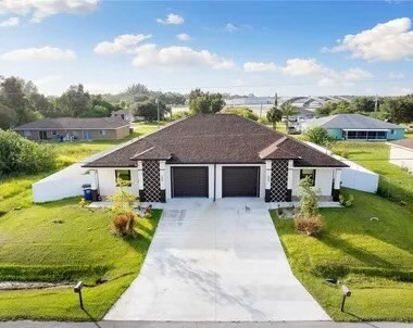2443 Daniel Ave N in Lehigh Acres, FL - Building Photo