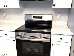 4728 Orange Grove Blvd, Unit 12 in North Fort Myers, FL - Foto de edificio - Building Photo