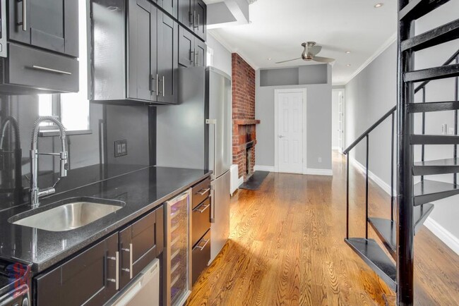 property at 209 E 25th St