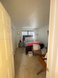 7160 NW 179th St, Unit 103 in Hialeah, FL - Building Photo - Building Photo