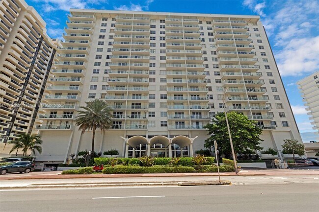 property at 5701 Collins Ave